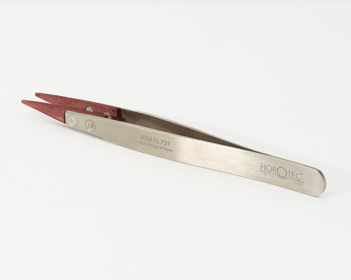 Fiber-Tipped Tweezer